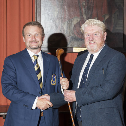 EIGCA President Tom Mackenzie receiving the Tri-Continent match trophy from Peter MacEvoy  