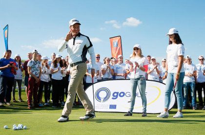 Alvaro Velasco gives a putting lesson to youngsters at the launch of GoGolf Europe at the KLM Open on Wednesday (Getty Images)