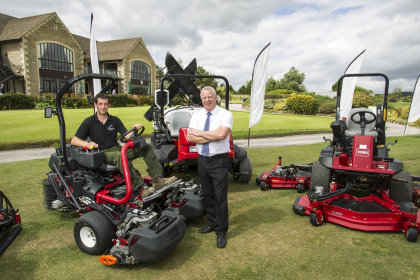 Cumberwell Park Golf Club’s course manager Matt James, seated, with Lely’s Robert Rees and a selection of the club’s first Toros in a new deal