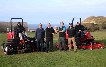 Jim Duncan, left of centre, from IOM Farmers shakes hands with Fred Gray Rowany GC. Also in the photo from left: Simon Miller, head greenkeeper, Mike Kewley, Rowany GC, Mike Atherton, IOM Farmers and Scott Howarth, greenkeeper