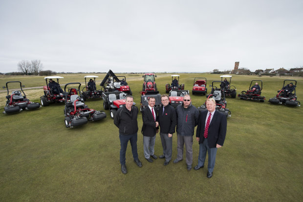 Stuart Gremo, Littlestone Golf Club chairman shaking hands with Lely’s Larry Pearman; and from left Lely’s Richard Wood, Malcolm Grand, course manager at Littlestone and Alan Bray, Littlestone's director of greens.