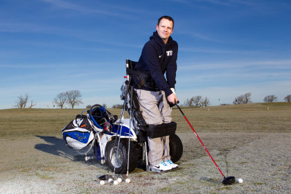 33 year old Paraplegic, Ryan MacDonald, who is able to play golf again with the help of a paragolf buggy / machine. Location: Mearns Castle Golf Club, Glasgow. (photo Sunday Post's Andrew Cawley)