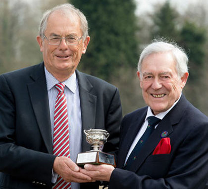 Bill Bryce (right) receives the Micklem Award from Nigel Evans (image © Leaderboard Photography)