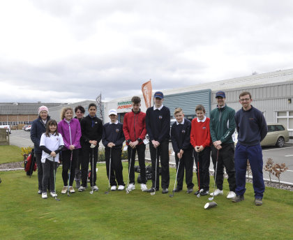 The Ipswich Golf Club Junior Development squad with chaperones, assistant pro Ian Scott (2nd right) and RJ National greenkeeper James Gotts (far right)