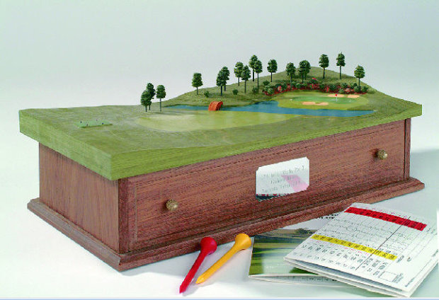 Possibly the world's most famous hole, Golden Bell at Augusta, on a walnut chest