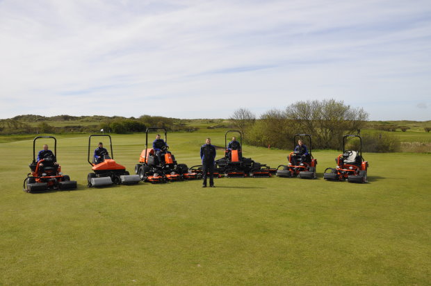 Head Greenkeeper Michael Mead (centre) with his greenkeeping team and the new Jacobsen mowers