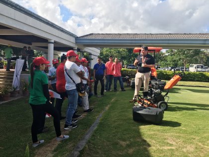 Josh Gagnuss, Jacobsen’s Product Support Manager, demonstrating the Eclipse 2 greens mower to conference attendees