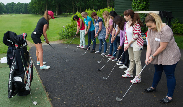 Ladies European Tour star Annabel Dimmock demonstrates the basics of the golf set-up at Stoke Park.
