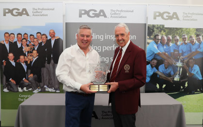 Stewart Russell receiving his Toby Sunderland Award from PGA captain Nicky Lumb (Andy Reddington / Getty Images)