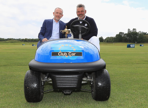 Marco Natale, Vice President of Club Car in EMEA and Darren Clarke, Captain of The 2016 Ryder Cup European team, in the captain’s vehicle that will be supplied to Le Golf National in 2018 (Getty Images)