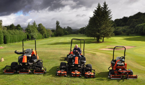 Course Manager, Drew McKechnie, with a few of the recently purchased Jacobsen machines