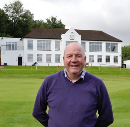 Douglas Park Golf Club Course Manager, Drew McKechnie with  club house behind