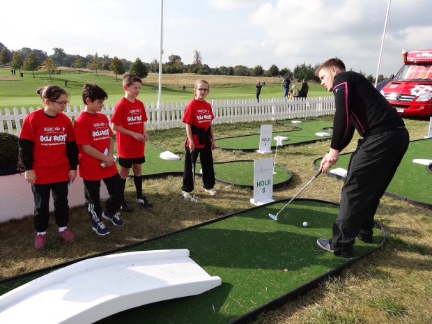 Golf Foundation RDO Ian Harvey with pupils from Maple Cross