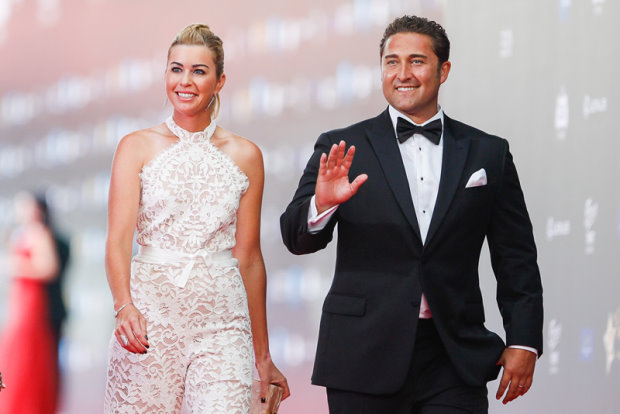 LPGA Tour star Paula Creamer joins her husband on the red carpet during the Mission Hills World Celebrity Pro-Am on the tropical island of Hainan in China