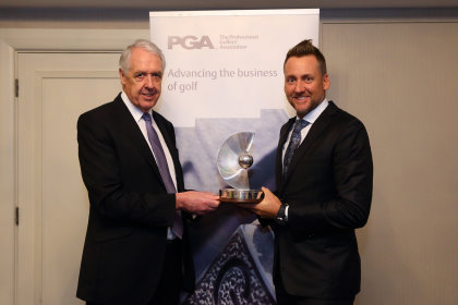 Ian Poulter receives his PGA Recognition Award from PGA captain Nicky Lumb (Jordan Mansfield /Getty Images)