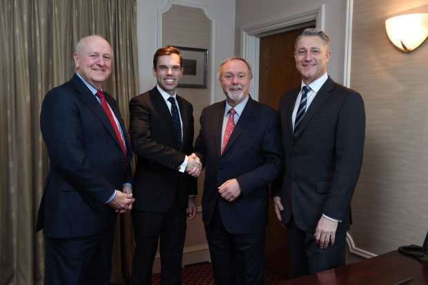 Welsh Government Cabinet Secretary for Economy and Infrastructure Ken Skates and Celtic Manor Resort Chairman Sir Terry Matthews shake hands on the agreements, flanked by Sisk Group Chief Executive Stephen Bowcott and NatWest Relationship Director Stuart Allison