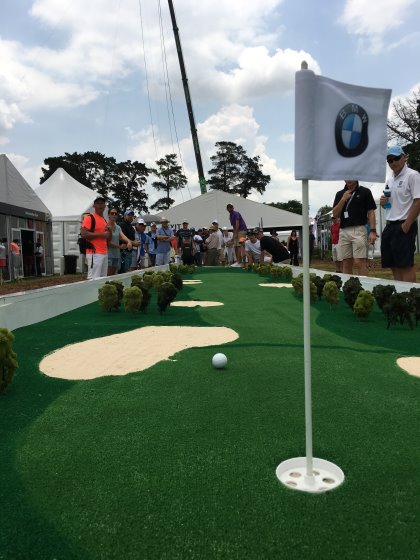The BMW ‘welcome village',featured an imossible long-putt challenge'