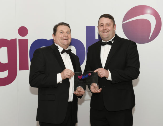 TGI Golf Partner of the Year Stephen Nicholls (left) of Rossendale Golf Club collects his award from previous winner Craig Mackie (Scotscraig GC).