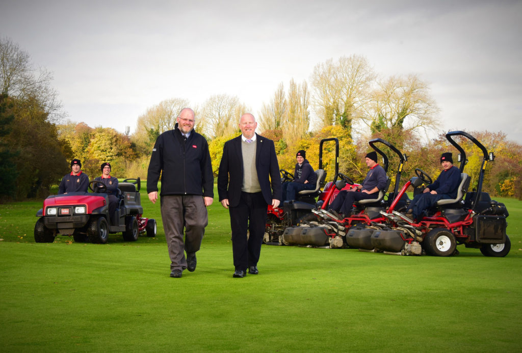 General manager Phil Grice, right, and Reesink’s Julian Copping with the club’s Toro machines which will be used to help tend 45 holes across two sites