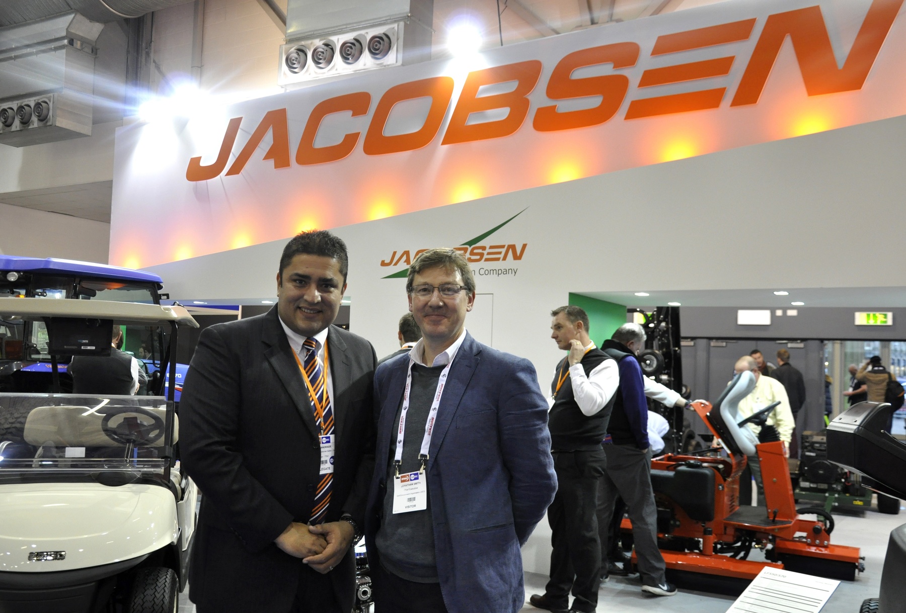 Andre Andrade director, international golf sales for Textron Specialized Vehicles Inc., and Jonathan Smith CEO of GEO at the Jacobsen stand during BTME in Harrogate, England